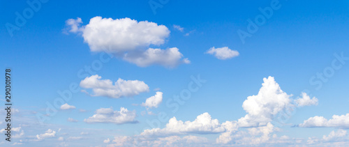 Blue sky with clouds background © tendo23