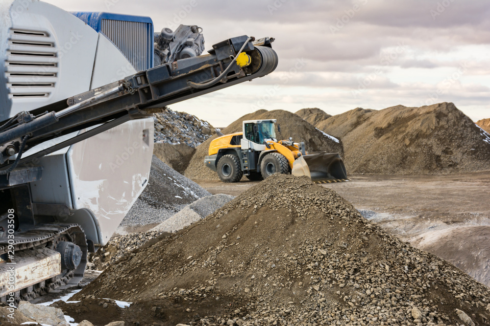 Stone crushing machine in an industrial production Stone crushing machine in an industrial production