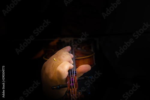 Violin on black background