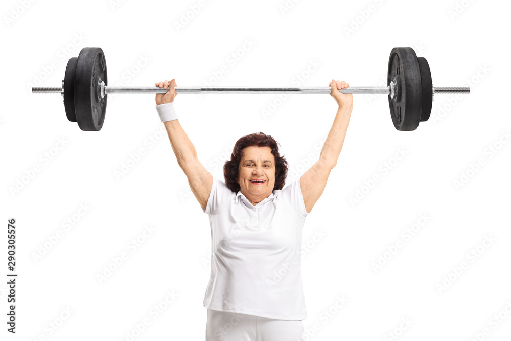 Strong elderly woman lifting a barbell Strong elderly woman lifting a barbell