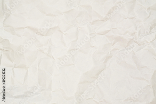 Abstract light brown white crumpled paper texture background