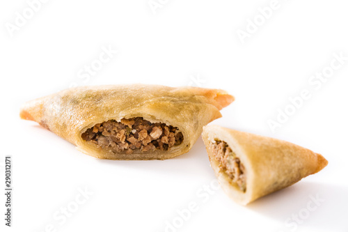 Samsa or samosas with meat and vegetables isolated on white background. Traditional Indian food photo