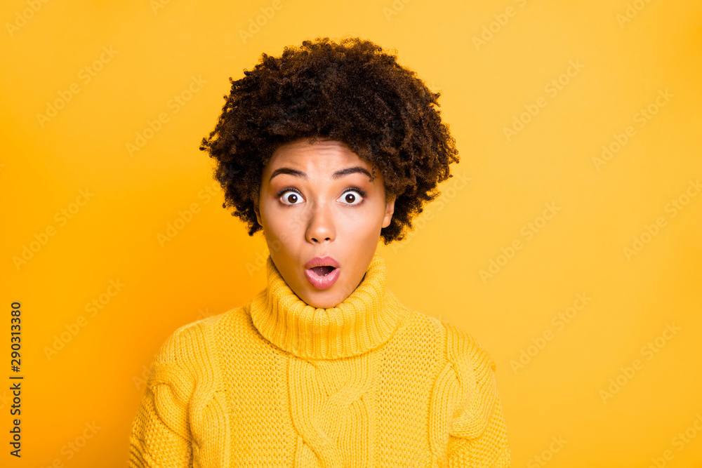 Photo of dark skin lady with open mouth and eye full fear wear warm knitted sweater isolated yellow background Photo of dark skin lady with open mouth and eye full fear wear warm knitted sweater isolated yellow background