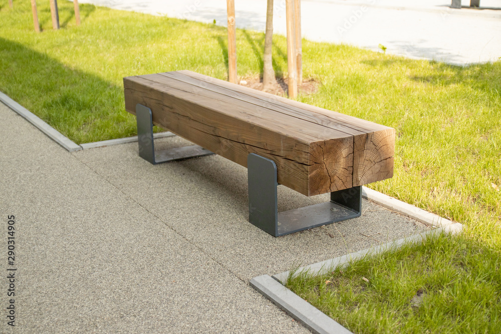 Street wooden bench in perspective, bench in the park Street wooden bench in perspective, bench in the park