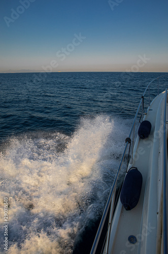 Summer morning traveling by yacht in the Saronic Gulf, Greece. © vikakurylo81