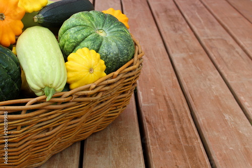 basket with fresh harvested vegetables harvested in autumn
