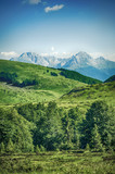 Panoramic view of gorgeous mountain ridge with high rocky peaks