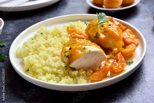 Chicken breasts in apricot sauce and couscous photo