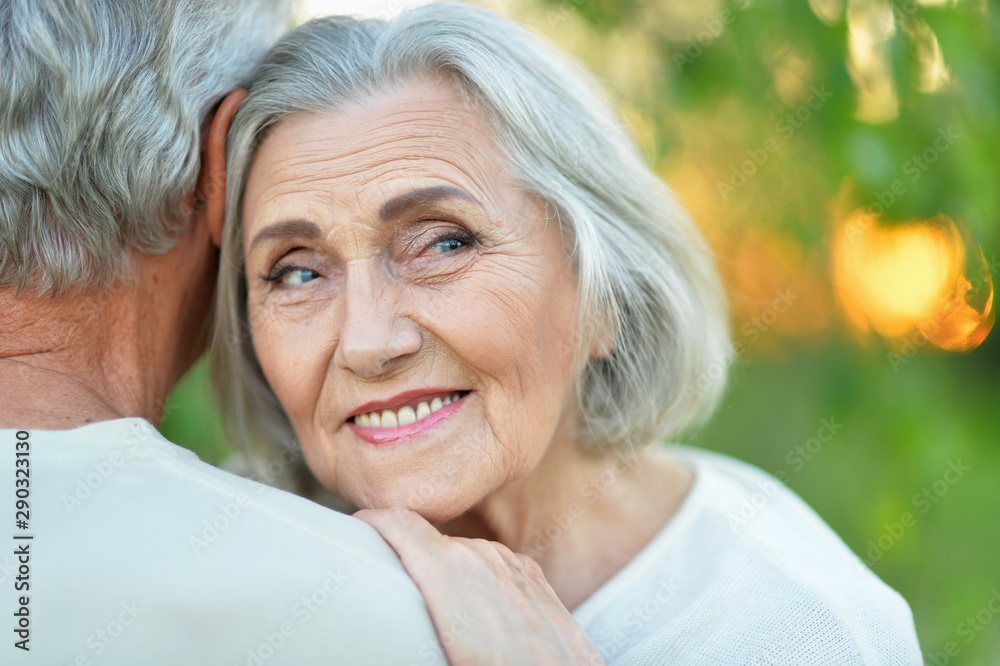 Close up portrait of beautiful senior couple hugging Close up portrait of beautiful senior couple hugging