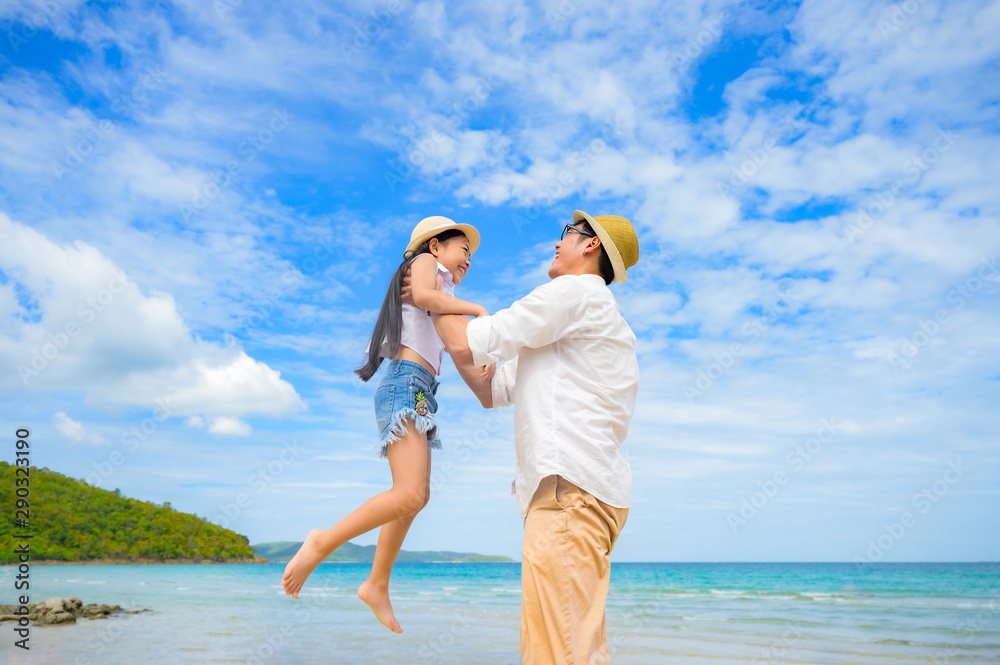 father holding drauther to flying around on the sea beach, playing fun together on Vacation and holidays between father and drauther, Dad takes care alone kid father holding drauther to flying around on the sea beach, playing fun together on Vacation and holidays between father and drauther, Dad takes care alone kid