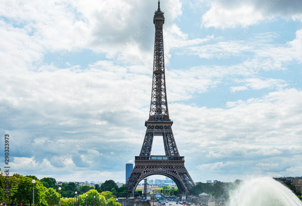 PARIS, FRANCE - July 31, 2019: PARIS, FRANCE - July 31, 2019: The Eiffel Tower is a wrought-iron lattice tower on the Champ de Mars in Paris, France.