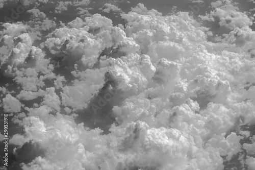 White clouds and sky, a view from airplane window © OlegD