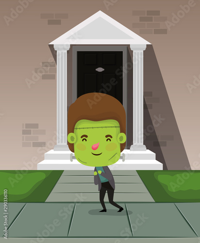halloween season scene with kid costume frankenstein