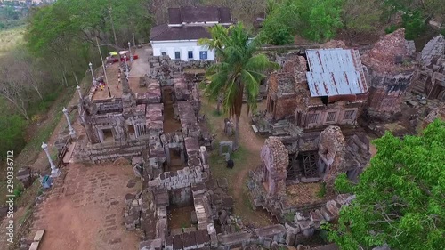 Aerial flight through the Phnom Chisor temple buildings in Cambodia. Famous culture palace. photo