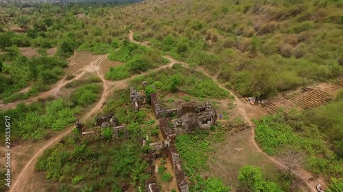 Aerial drone flight around the Phnom Chisor Temple in Cambodia. Amazing historic architecture. Asia. photo