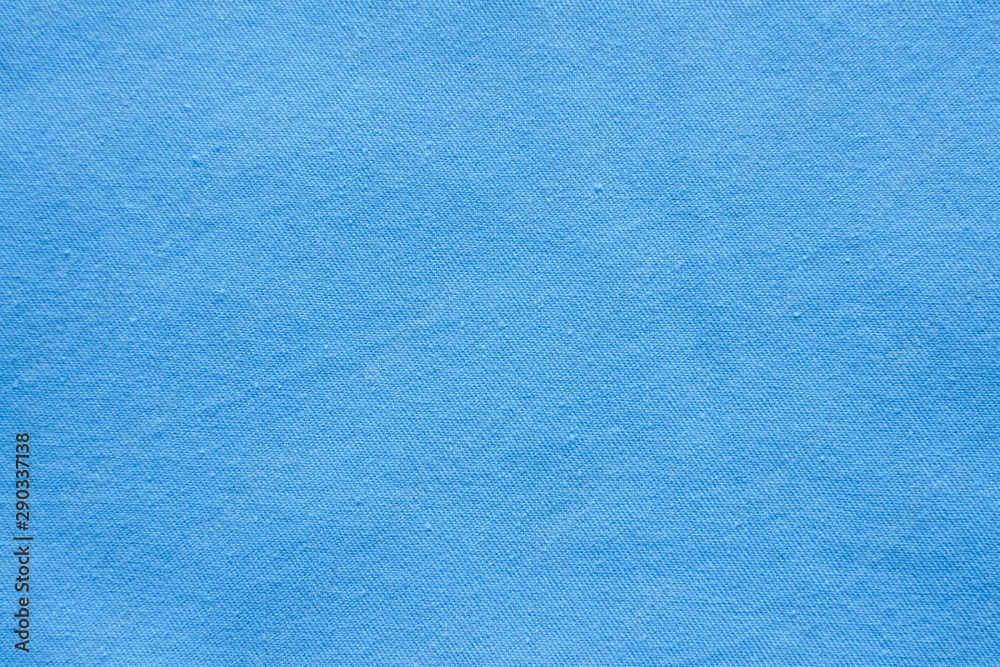 Blue linen cloth texture. Natural fabric material background