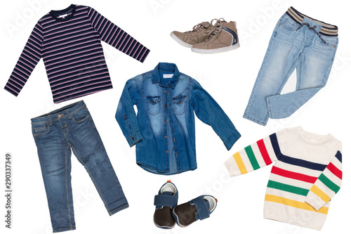 Collage set of children clothes. Denim jeans or pants, two pair shoes, a jeans shirt, striped shirt and a sweater for child boy isolated on a white background. Concept spring autumn and summer clothes © Olga