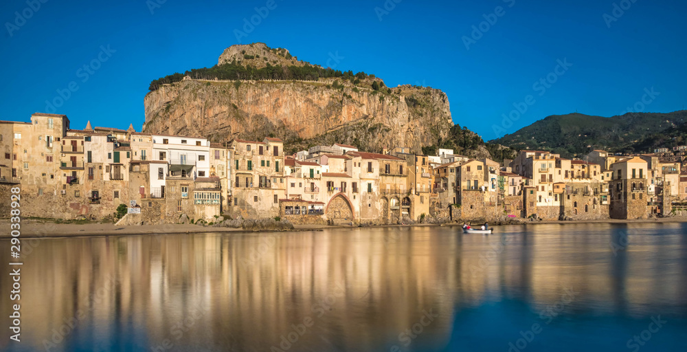 View of the harbor and the old town of Cefalu, one of the most beautiful places in Italy.