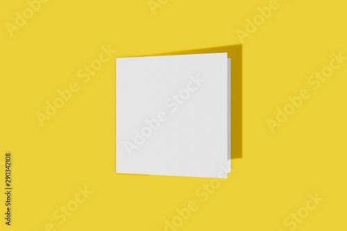 Mockup square booklet, brochure, invitation isolated on a yellow background with hard cover and realistic shadow. 3D rendering.