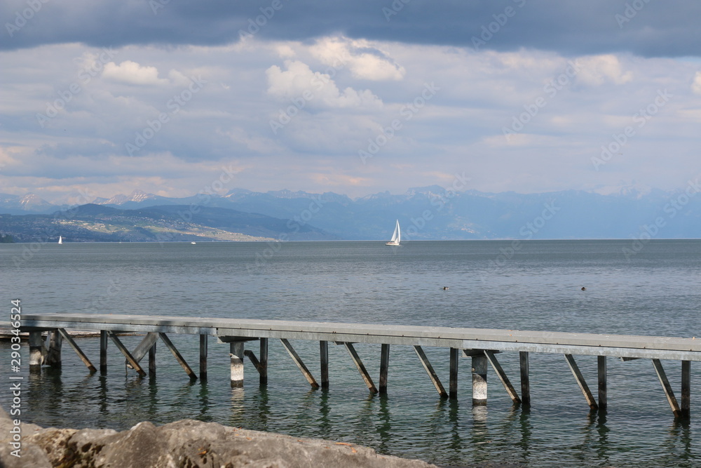 Storm is coming on the Leman lake with a sailboat
