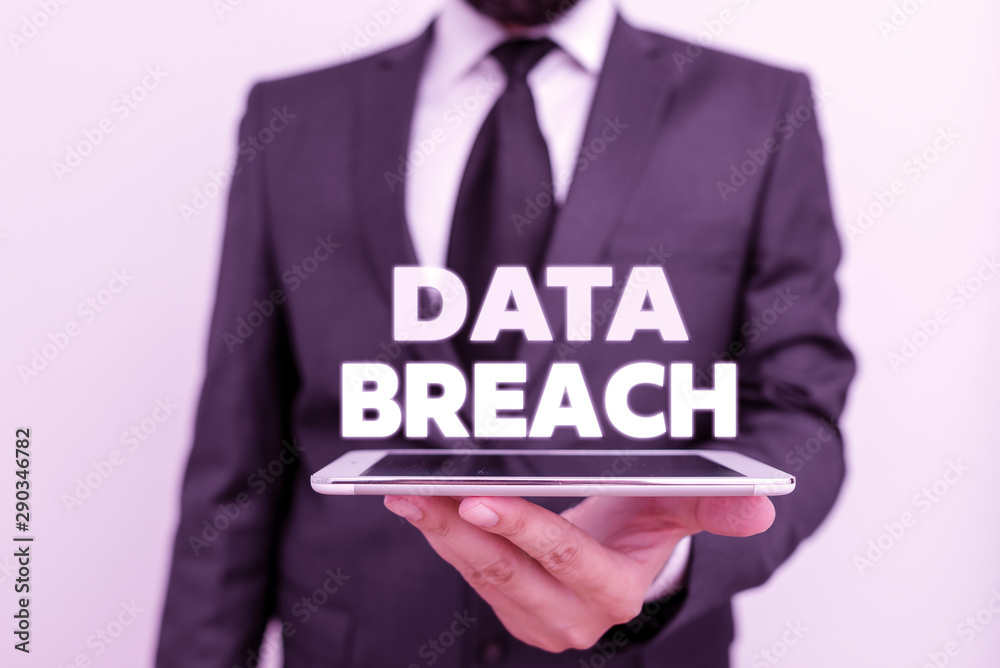 Writing note showing Data Breach. Business concept for security incident where sensitive protected information copied Writing note showing Data Breach. Business concept for security incident where sensitive protected information copied