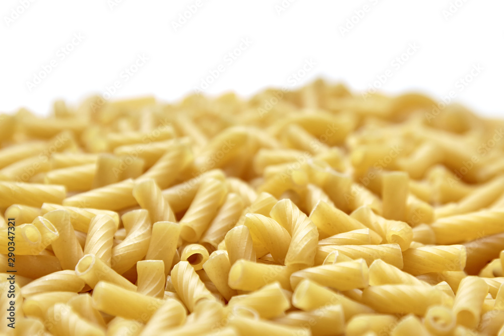 Tortiglioni italian pasta is short pasta with ribbed surface and straight cut, similar to small tubes Tortiglioni italian pasta is short pasta with ribbed surface and straight cut, similar to small tubes