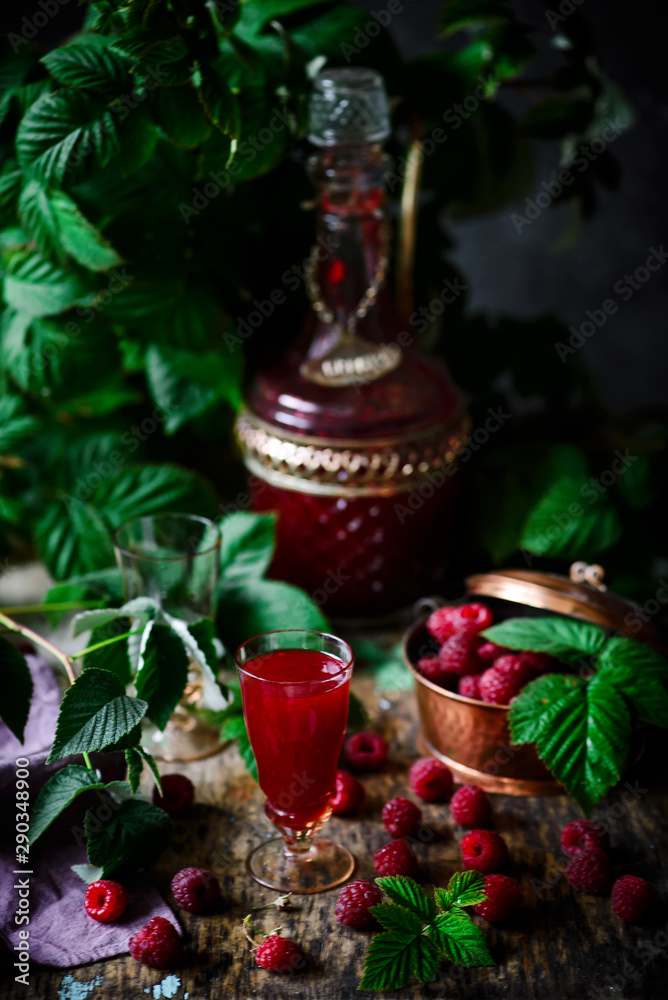 raspberry liquor...style rustic. selective focus raspberry liquor...style rustic. selective focus