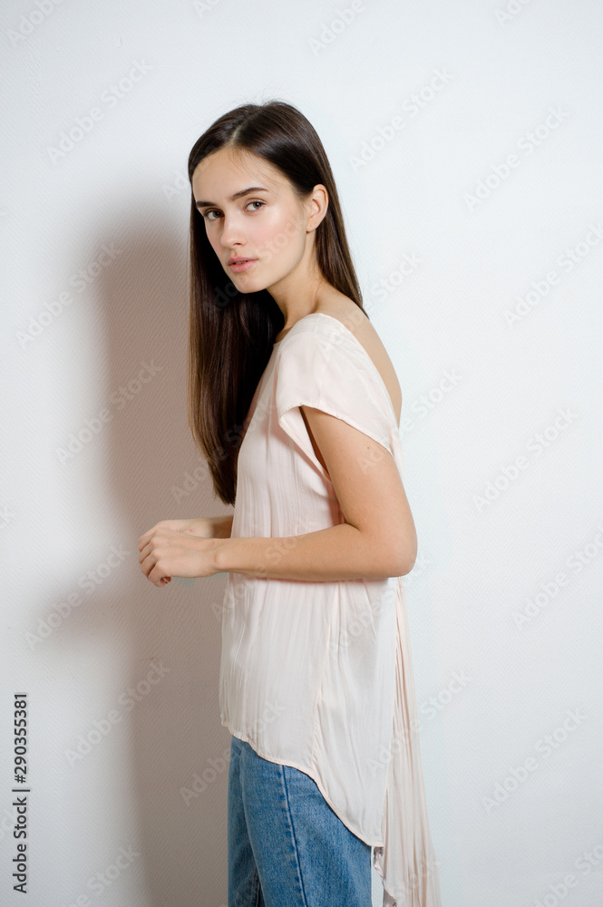 Young pretty woman against white background Young pretty woman against white background
