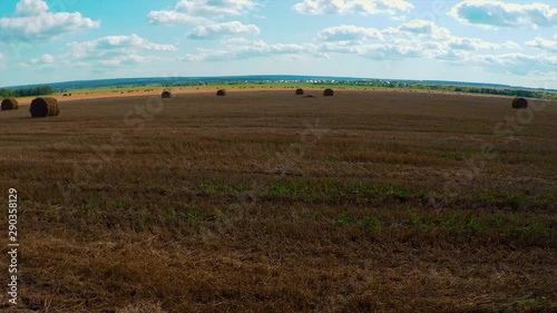 Clouds float over the field. Relaxation. Peace. Timelapse