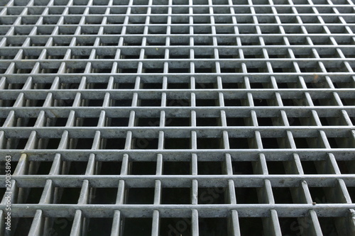 Side view on a grid over a hole
