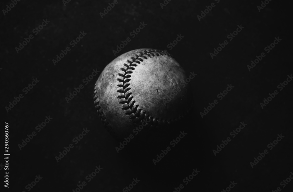 Low key baseball closeup in shadows with black background. Dark and moody  sports image. Stock Photo | Adobe Stock
