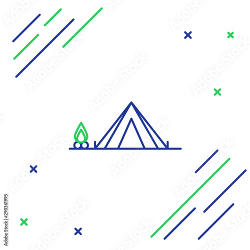 Blue and green line Tourist tent with wood fire icon isolated on white background. Camping symbol. Colorful outline concept. Vector Illustration