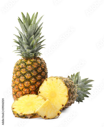 Tasty raw pineapple with slices on white background