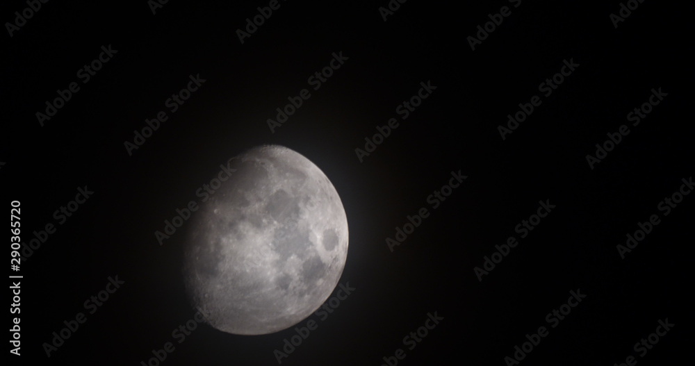 Obraz premium Half Moon Background being Earth's only permanent natural satellite