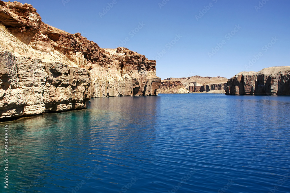 Band-e Amir lakes near Bamyan (Bamiyan) in Central Afghanistan. Band e Amir was the first national park in Afghanistan. This is the largest of the natural blue lakes at Band e Amir in the Hindu Kush.