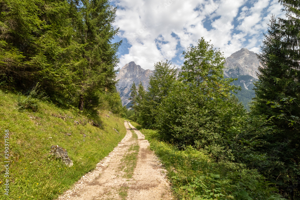 Panoramic mountain road / path in Italian Alps in middle of august Panoramic mountain road / path in Italian Alps in middle of august