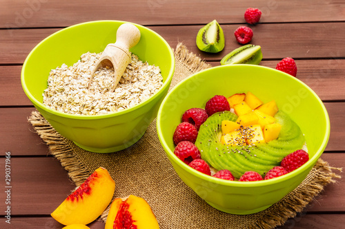 Oatmeal bowl with fresh berries and fruits