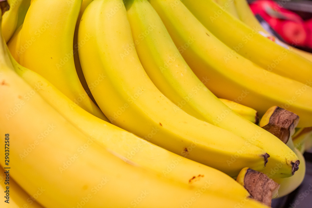 Several banana bunches at the grocery store