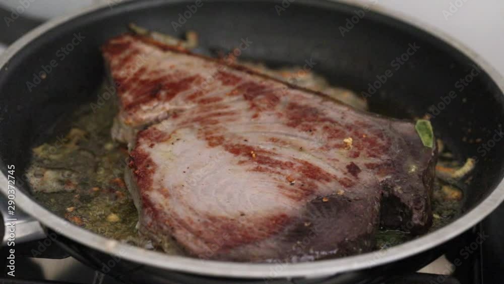 frying tuna on frying pan