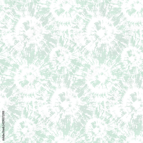 Blurry shibori tie dye sunburst circle background. Seamless pattern on bleached resist white background. Japanese style irregular dip dyed batik textile. Variegated textured trendy fashion swatch.