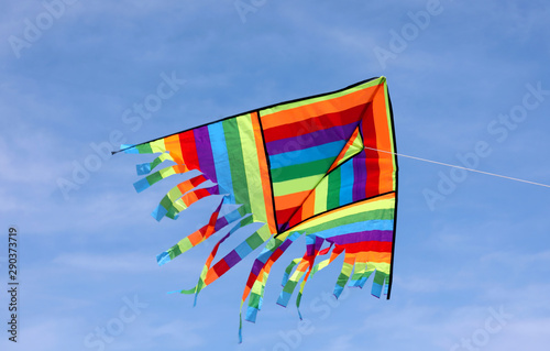 Multicolors kite flying on the blue sky