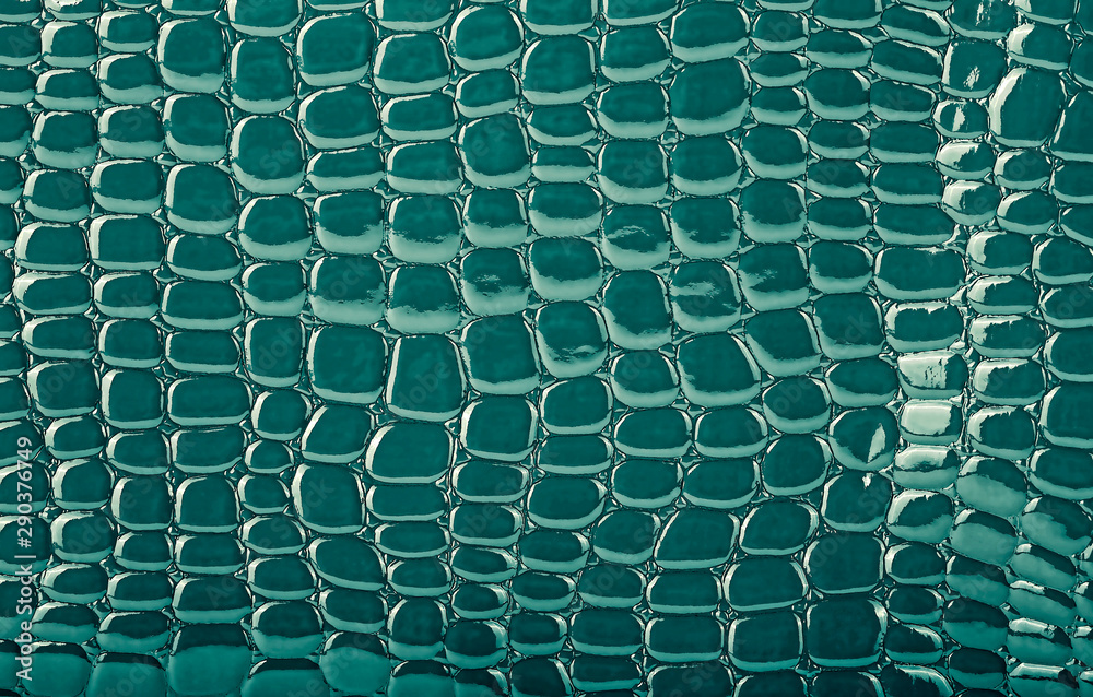 Naklejka premium Crocodile leather texture, closeup. Abstract background.