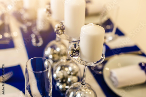 Place setting for Christmas in blue and white tone