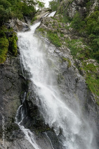 High Waterfall on a Mountain Range