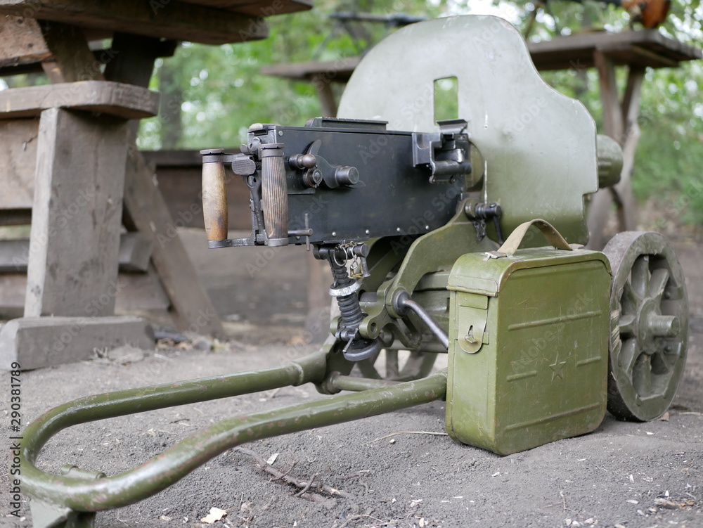 Maxim machine gun.  Water cooling of the barrel. box for machine gun ammunition. weapons of the second world war. Green camouflage.