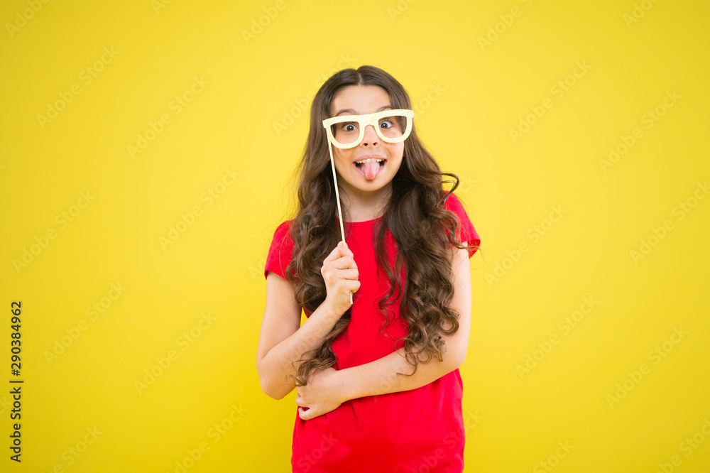 hello summer. child ready for party. prepare for party. happy girl on yellow background. summer fashion. small girl with party glasses. small girl hold funny glasses. happy birthday. party elements hello summer. child ready for party. prepare for party. happy girl on yellow background. summer fashion. small girl with party glasses. small girl hold funny glasses. happy birthday. party elements