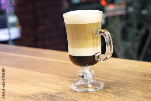cup of coffee on wooden table