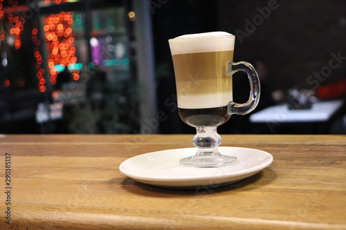 cup of coffee on wooden table