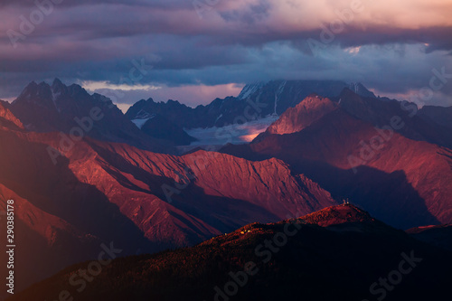 A look at the grand ridge at twilight. Location Upper Svaneti  Georgia country  Europe. Main Caucasian ridge.