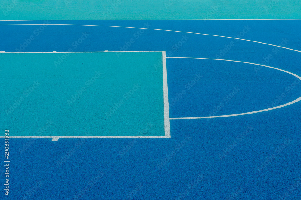 Abstract, blue background of newly made outdoor basketball court